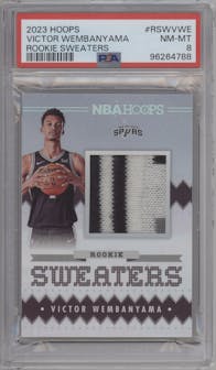 Victor Wembanyama from the 2023-24 Panini NBA Hoops set graded by PSA and given an overall grade of 8.