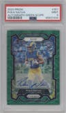 Puka Nacua from the 2023 Panini Prizm set featuring a Green Scope parallel graded by PSA and given an overall grade of 9.