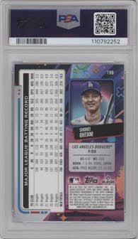 Shohei Ohtani from the 2024 Topps Cosmic Chrome set featuring a Purple Nebula Refractor parallel graded by PSA and given an overall grade of 10.