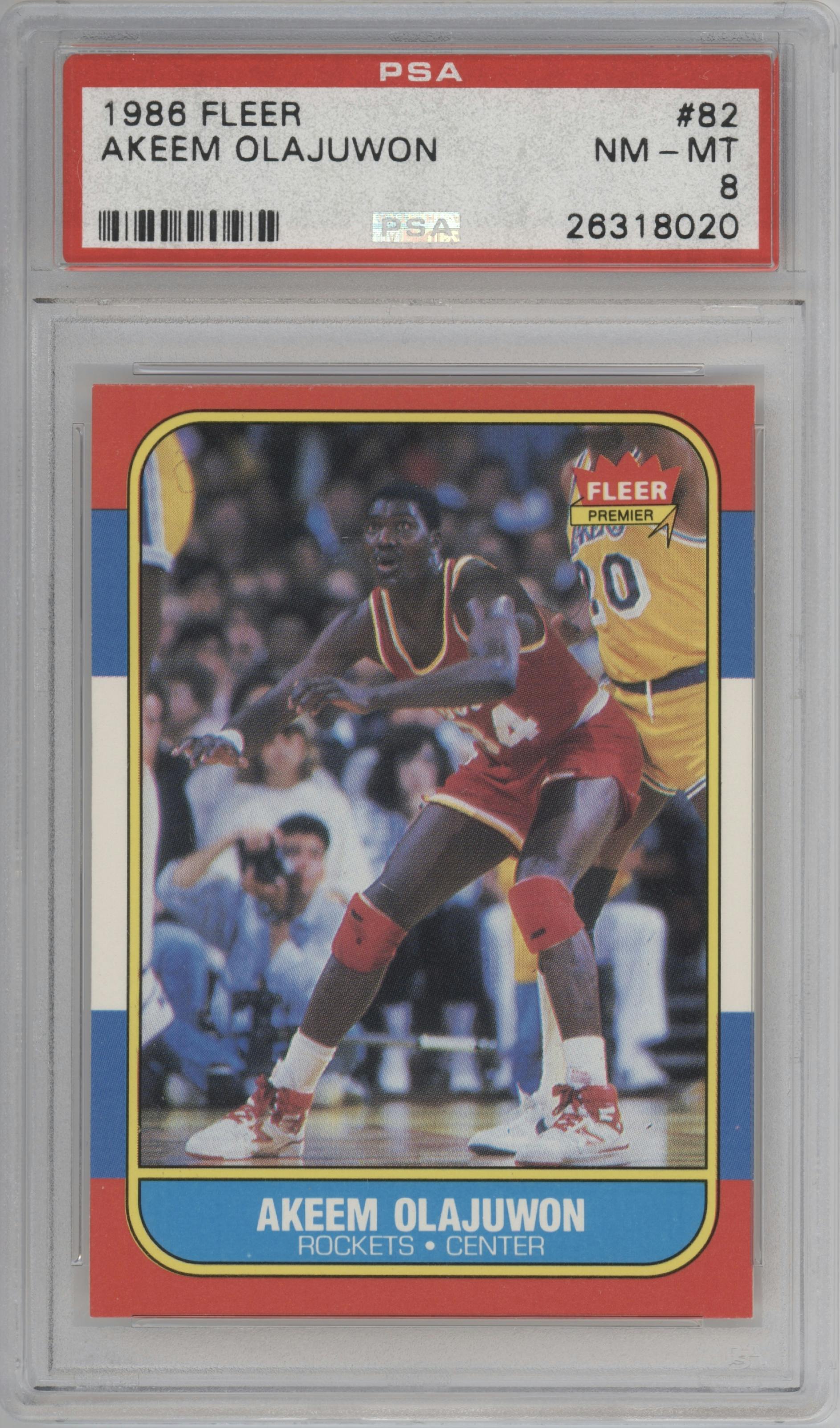 Akeem Olajuwon from the 1986-87 Fleer set graded by PSA and given an overall grade of 8.