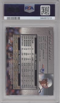 Tom Brady from the 2000 Fleer Metal set graded by PSA and given an overall grade of 8.