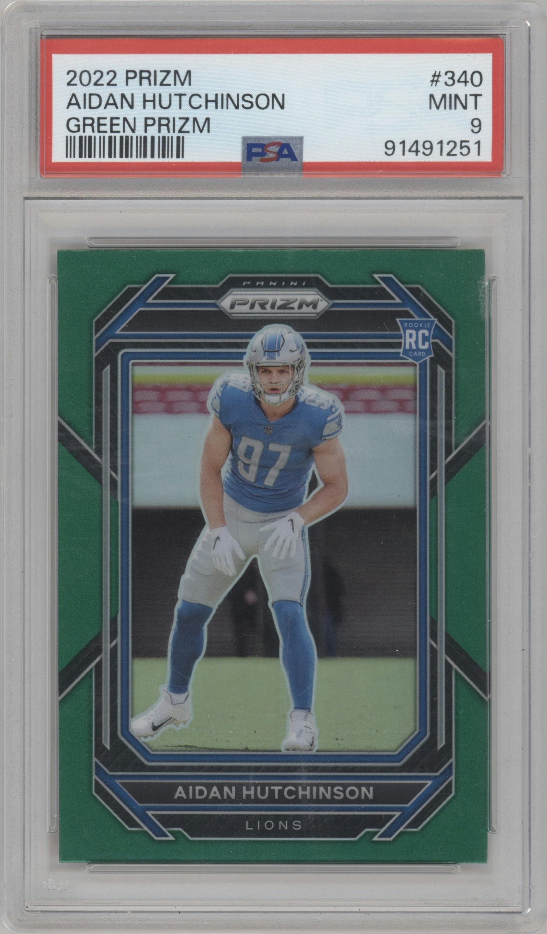 Aidan Hutchinson from the 2022 Panini Prizm set featuring a Green Prizm parallel graded by PSA and given an overall grade of 9.
