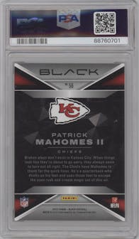 Patrick Mahomes II from the 2023 Panini Black set featuring a Emerald parallel graded by PSA and given an overall grade of 9.