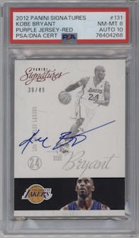 Kobe Bryant from the 2012-13 Panini Signatures set featuring a Red parallel graded by PSA and given an overall grade of 8.