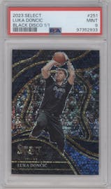 Luka Doncic from the 2023-24 Panini Select set featuring a Black Disco Prizm parallel graded by PSA and given an overall grade of 9.