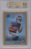 Saquon Barkley from the 2018 Panini Donruss Optic set featuring a Orange parallel graded by Beckett and given an overall grade of 9.5.