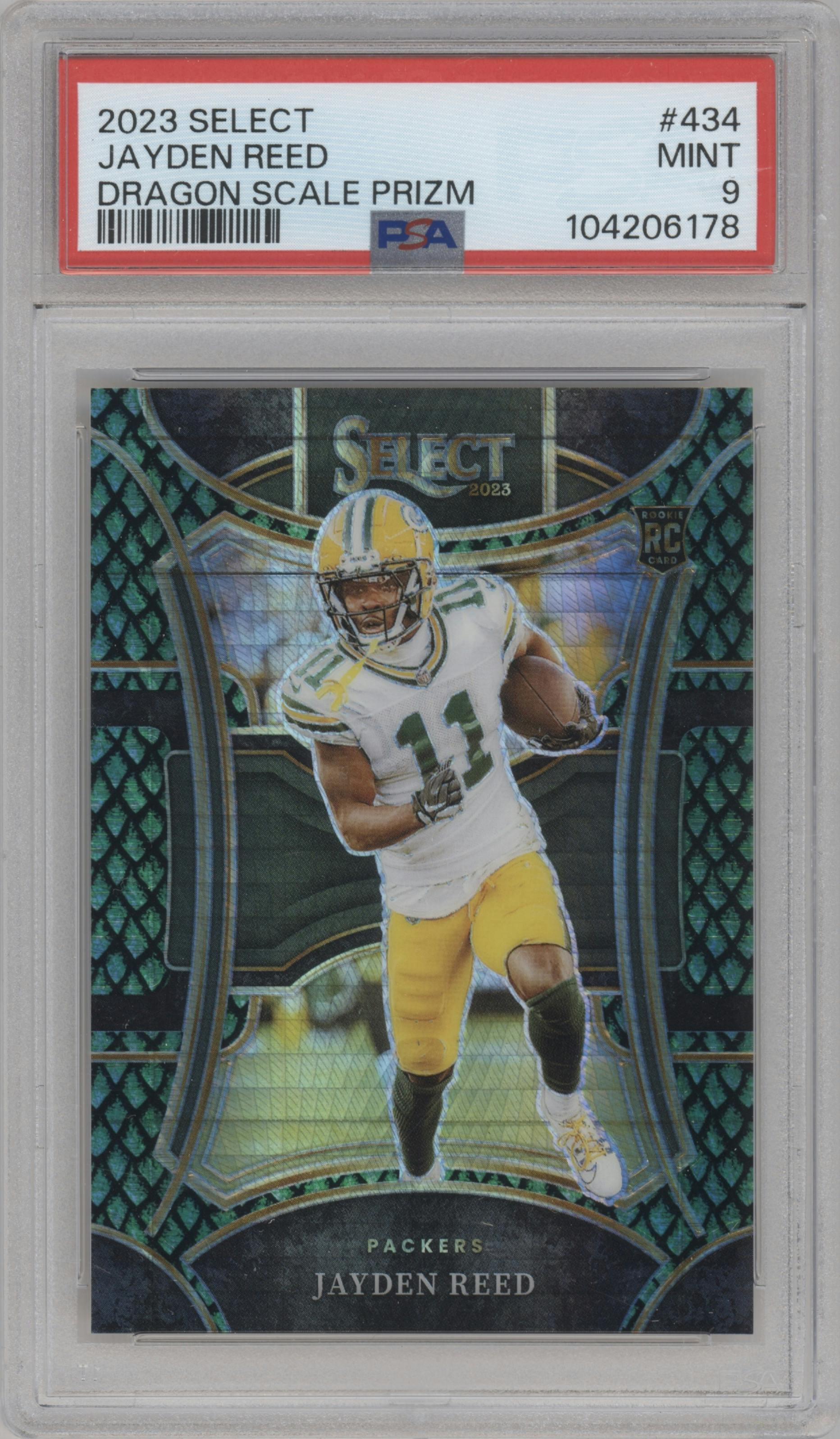 Jayden Reed from the 2023 Panini Select set featuring a Dragon Scale parallel graded by PSA and given an overall grade of 9.