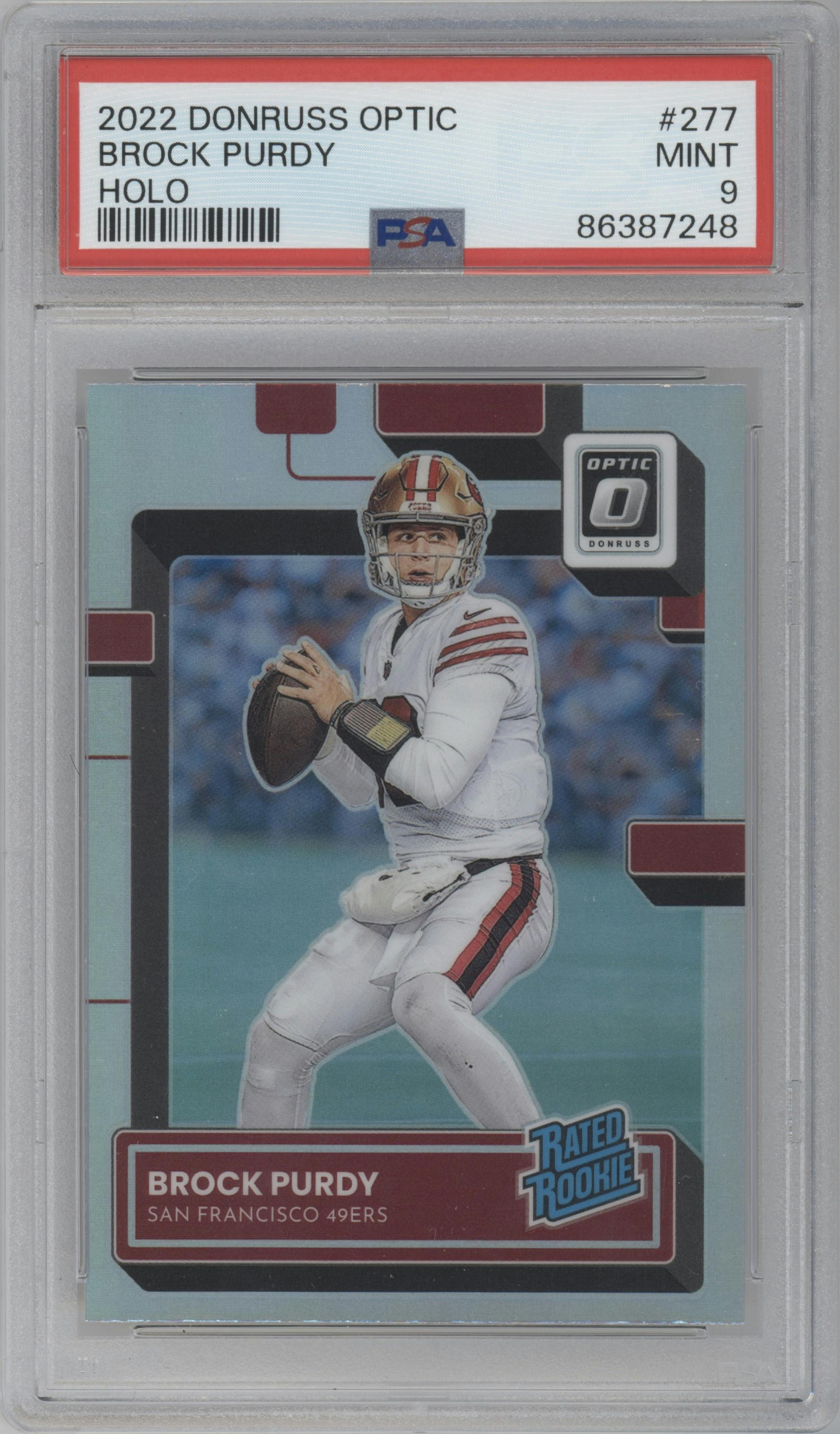 Brock Purdy from the 2022 Panini Donruss Optic set featuring a Holo parallel graded by PSA and given an overall grade of 9.