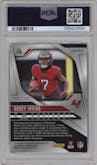 Bucky Irving from the 2024 Panini Prizm set featuring a Red Wave parallel graded by PSA and given an overall grade of 9.