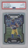 Puka Nacua from the 2023 Panini Prizm set featuring a Silver Prizm parallel graded by PSA and given an overall grade of 10.