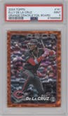 Elly De La Cruz from the 2024 Topps  set featuring a Orange Crackle Foil parallel graded by PSA and given an overall grade of 9.