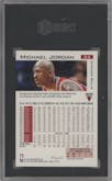 Michael Jordan from the 1997-98 Fleer set featuring a Crystal parallel graded by SGC and given an overall grade of 8.5.