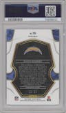 Justin Herbert from the 2022 Panini Select set featuring a Blue Disco Prizm parallel graded by PSA and given an overall grade of 9.