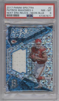Patrick Mahomes II from the 2017 Panini Spectra set featuring a Neon Blue parallel graded by PSA and given an overall grade of 8.