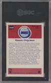 Akeem Olajuwon from the 1986-87 Fleer set graded by SGC and given an overall grade of 6.