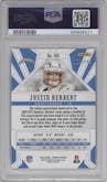 Justin Herbert from the 2020 Panini Phoenix set featuring a Red parallel graded by PSA and given an overall grade of 10.