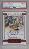 Eric Dickerson from the 2021 Panini Flawless set featuring a Ruby parallel graded by PSA and given an overall grade of 9.