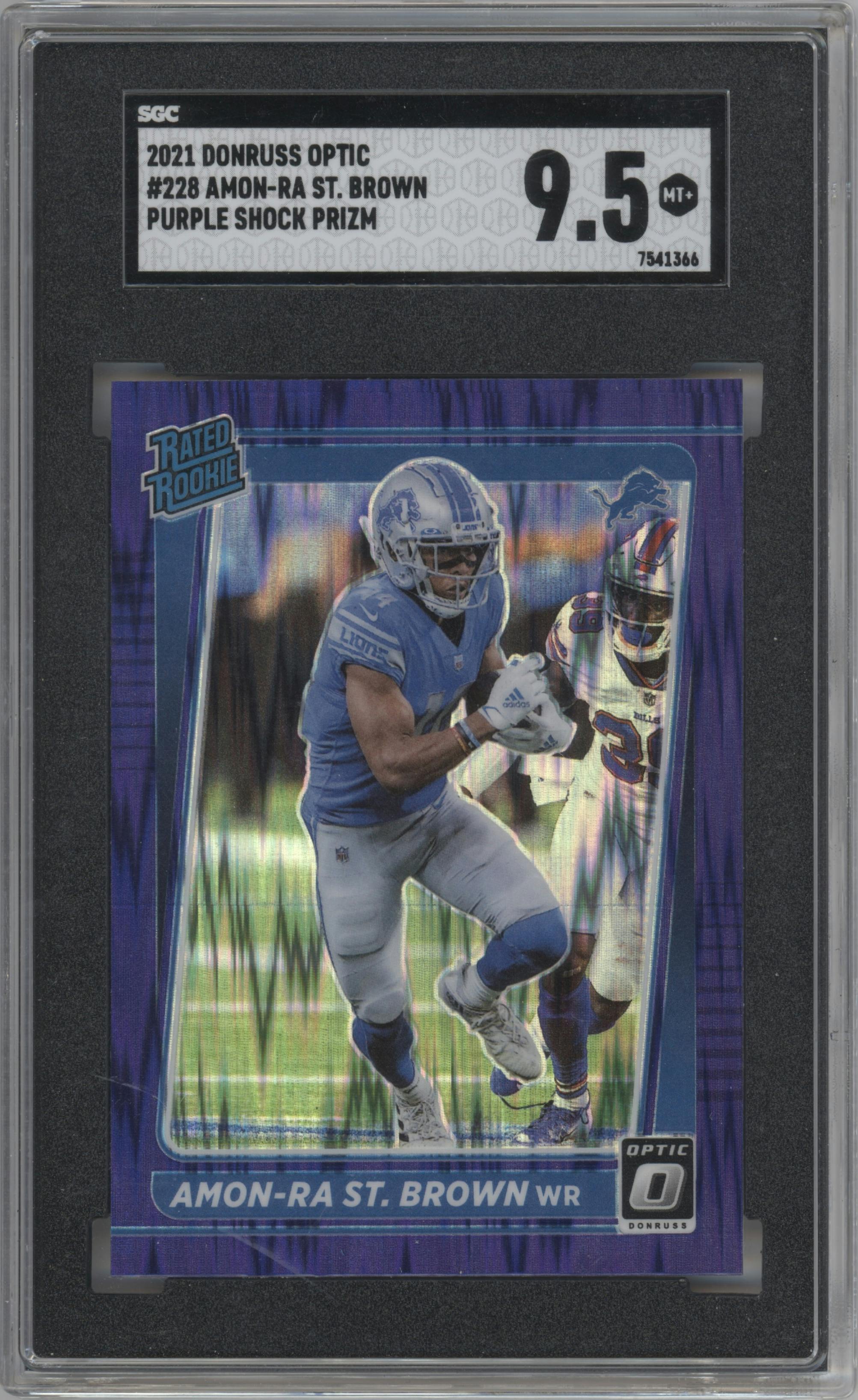 Amon-Ra St. Brown from the 2021 Panini Donruss Optic set featuring a Purple Shock parallel graded by SGC and given an overall grade of 9.5.