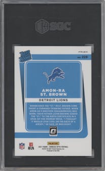 Amon-Ra St. Brown from the 2021 Panini Donruss Optic set featuring a Purple Shock parallel graded by SGC and given an overall grade of 9.5.