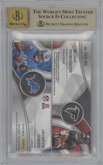 Bijan Robinson/Jahmyr Gibbs from the 2023 Panini Spectra set featuring a Neon Green parallel graded by Beckett and given an overall grade of 9.5.