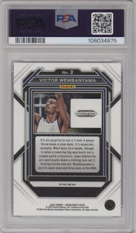 Victor Wembanyama from the 2023-24 Panini Prizm Draft Picks set featuring a Green Prizm parallel graded by PSA and given an overall grade of 10.