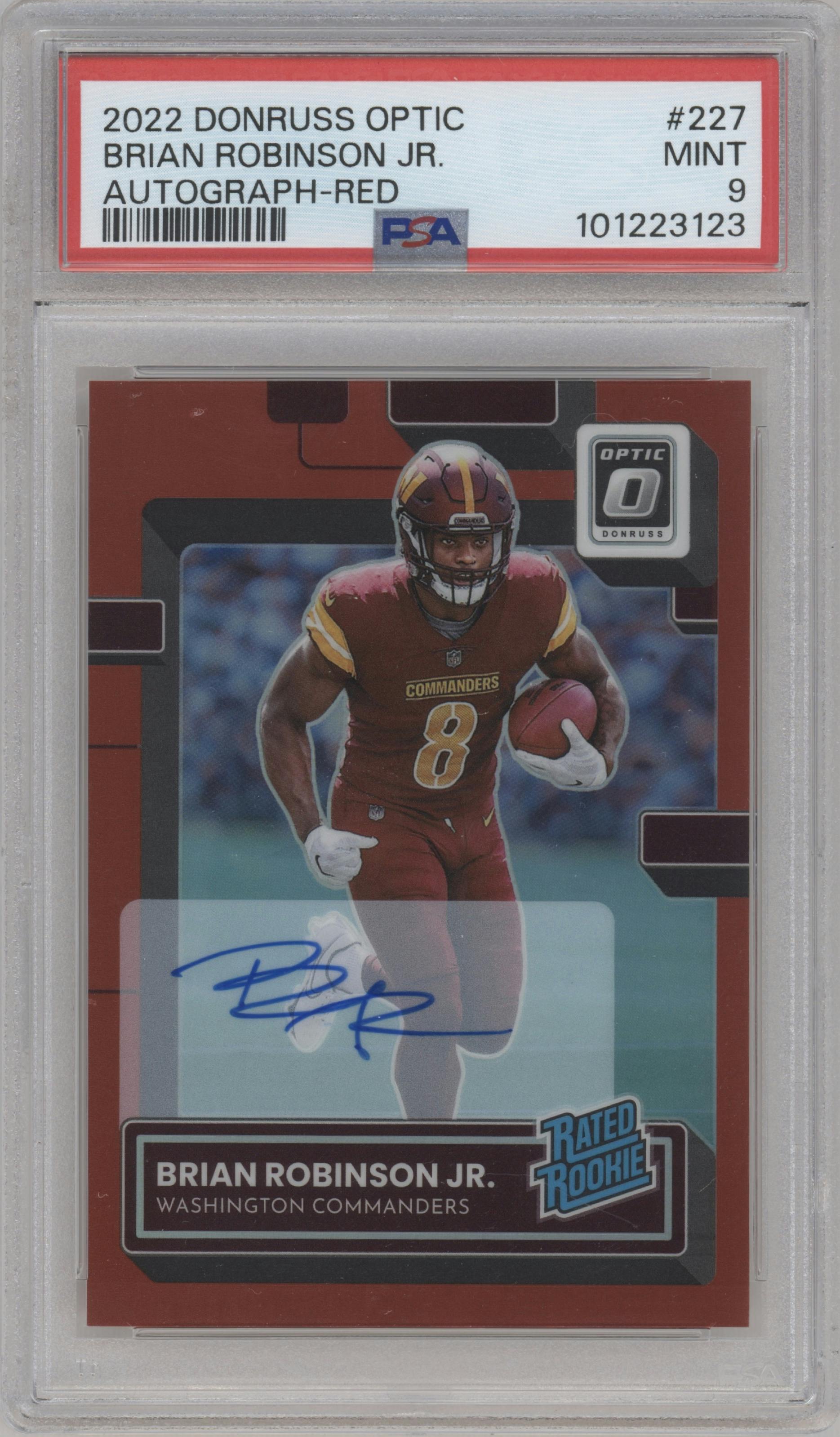 Brian Robinson Jr. from the 2022 Panini Donruss Optic set featuring a Red parallel graded by PSA and given an overall grade of 9.