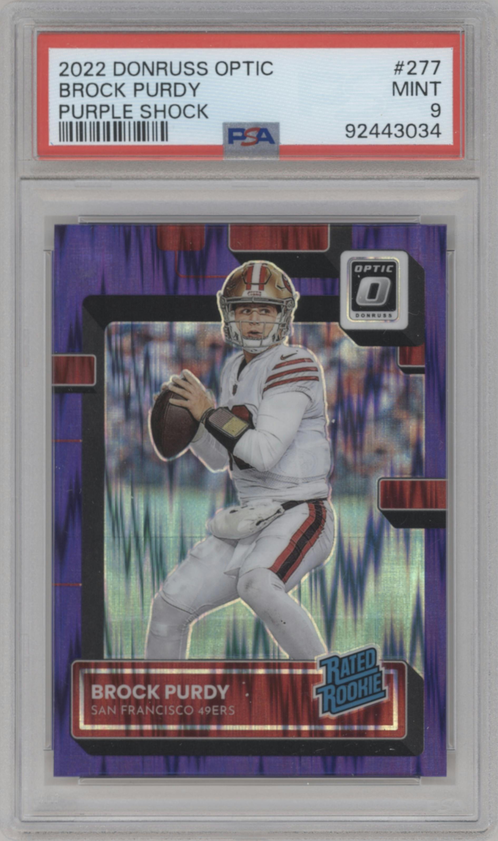 Brock Purdy from the 2022 Panini Donruss Optic set featuring a Purple Shock parallel graded by PSA and given an overall grade of 9.