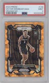Victor Wembanyama from the 2023-24 Panini Prizm set featuring a Orange Ice parallel graded by PSA and given an overall grade of 9.
