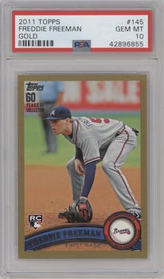 Freddie Freeman from the 2011 Topps set featuring a Gold parallel graded by PSA and given an overall grade of 10.