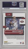 Brock Purdy from the 2022 Panini Donruss Optic set featuring a Hyper Red parallel graded by PSA and given an overall grade of 9.