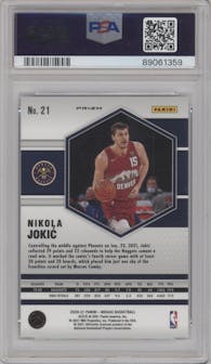 Nikola Jokic from the 2020-21 Panini Mosaic set featuring a Choice Peacock parallel graded by PSA and given an overall grade of 9.