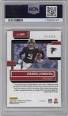 Drake London from the 2022 Panini Donruss Optic set featuring a Aqua parallel graded by PSA and given an overall grade of 9.