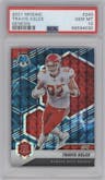 Travis Kelce from the 2021 Panini Mosaic set featuring a Genesis parallel graded by PSA and given an overall grade of 10.