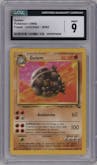 Golem from the 1999 Pokemon set graded by CSG and given an overall grade of 9.
