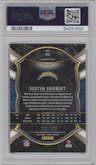 Justin Herbert from the 2020 Panini Select set featuring a Tri-Color parallel graded by PSA and given an overall grade of 9.