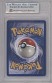Machamp from the 1999 Pokemon set graded by Beckett and given an overall grade of 7.5.
