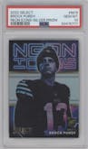 Brock Purdy from the 2022 Panini Select set featuring a Silver Prizm parallel graded by PSA and given an overall grade of 10.