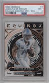 Amon-Ra St. Brown from the 2023 Panini Obsidian set featuring a Electric Etch Orange  parallel graded by PSA and given an overall grade of 9.