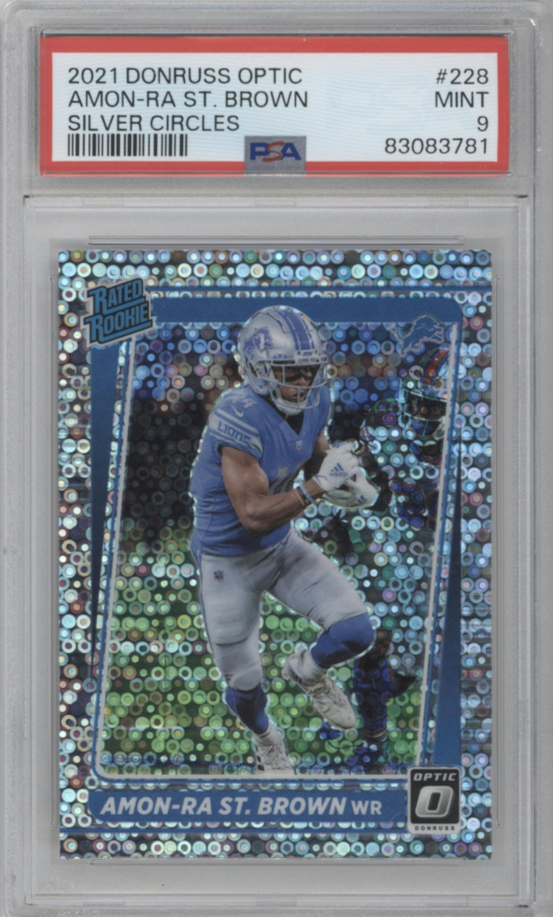 Amon-Ra St. Brown from the 2021 Panini Donruss Optic set featuring a Silver Circles parallel graded by PSA and given an overall grade of 9.
