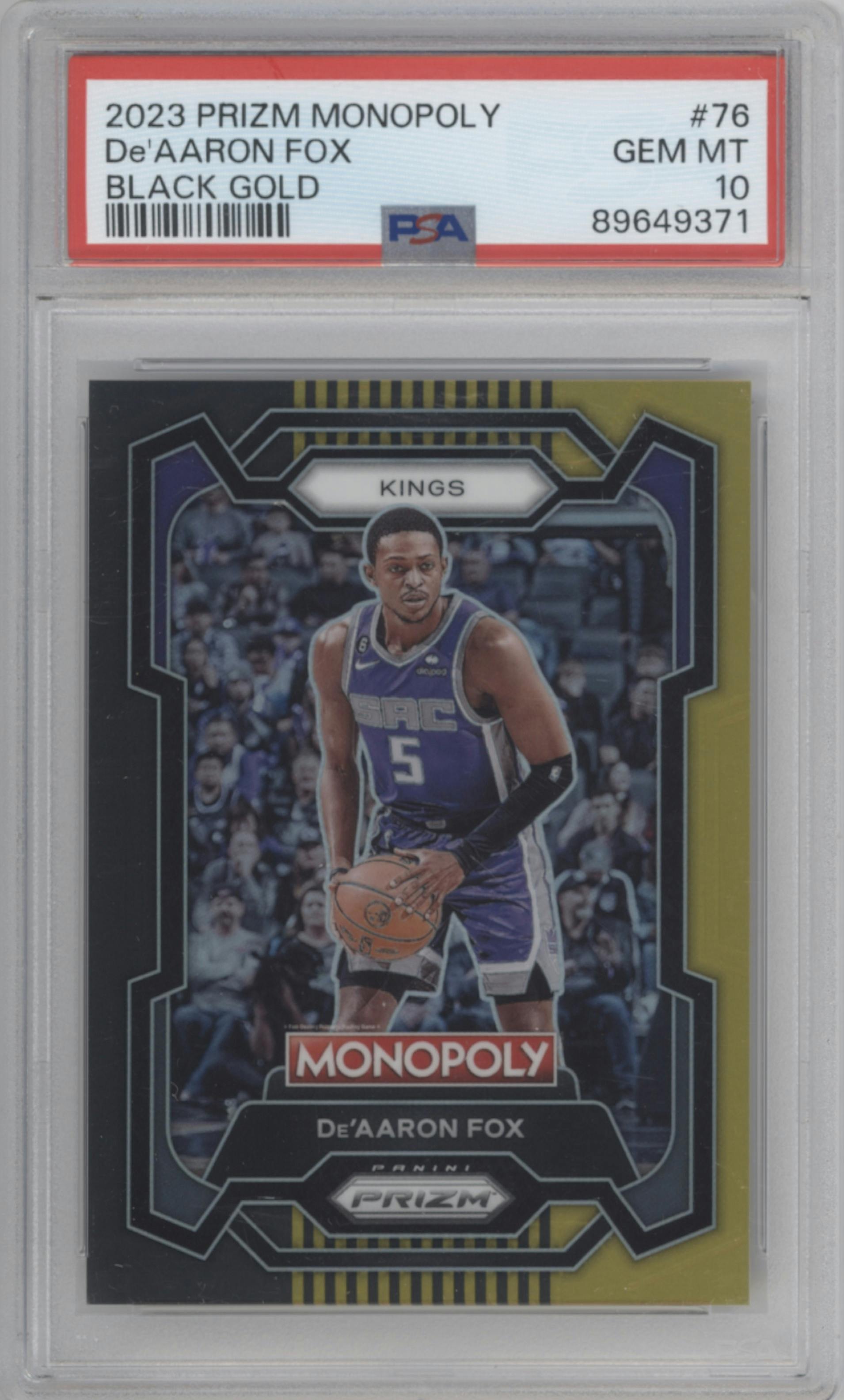 De'Aaron Fox from the 2023-24 Panini Prizm Monopoly set featuring a Black Gold parallel graded by PSA and given an overall grade of 10.