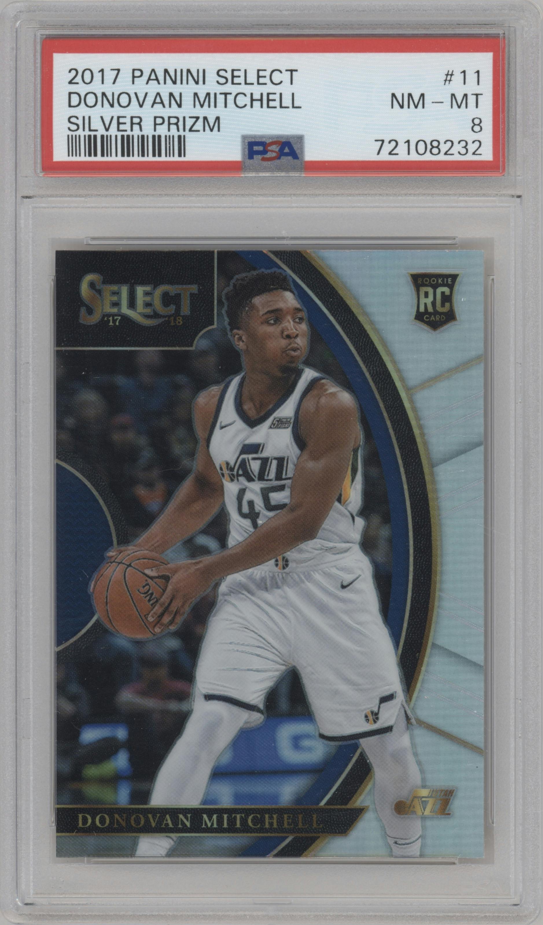 Donovan Mitchell from the 2017-18 Panini Select set featuring a Silver Prizm  parallel graded by PSA and given an overall grade of 8.