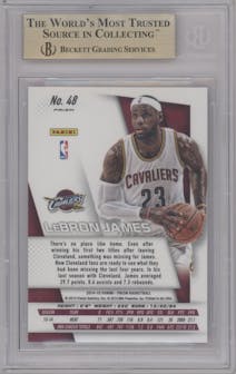 LeBron James from the 2014-15 Panini Prizm set featuring a Red/White/Blue Pulsar parallel graded by Beckett and given an overall grade of 9.5.