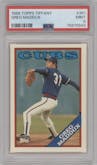 Greg Maddux from the 1988 Topps set featuring a Tiffany parallel graded by PSA and given an overall grade of 9.