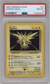 Zapdos from the 1999 Pokemon set graded by PSA and given an overall grade of 8.