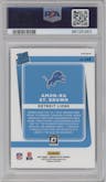 Amon-Ra St. Brown from the 2021 Panini Donruss Optic set featuring a Holo parallel graded by PSA and given an overall grade of 9.