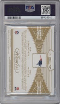Rob Gronkowski/Wes Welker from the 2022 Panini Flawless set featuring a Emerald parallel graded by PSA and given an overall grade of 9.