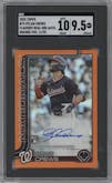 Dylan Crews from the 2025 Topps set featuring a Orange Refractor parallel graded by SGC and given an overall grade of 9.5.