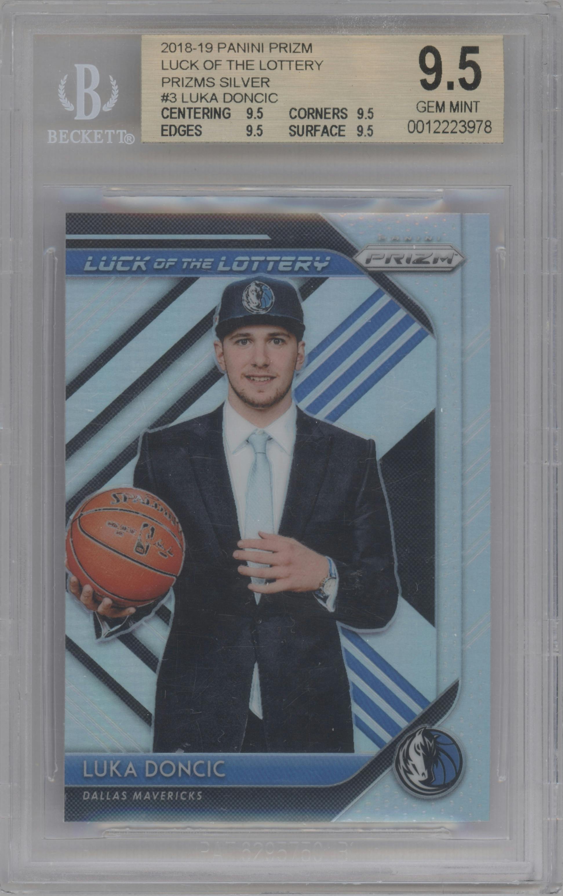 Luka Doncic from the 2018-19 Panini Prizm set featuring a Silver Prizm parallel graded by Beckett and given an overall grade of 9.5.