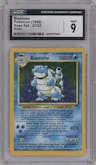 Blastoise from the 1999 Pokemon set graded by CSG and given an overall grade of 9.