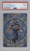 Zach Charbonnet from the 2023 Panini Mosaic set graded by PSA and given an overall grade of 9.
